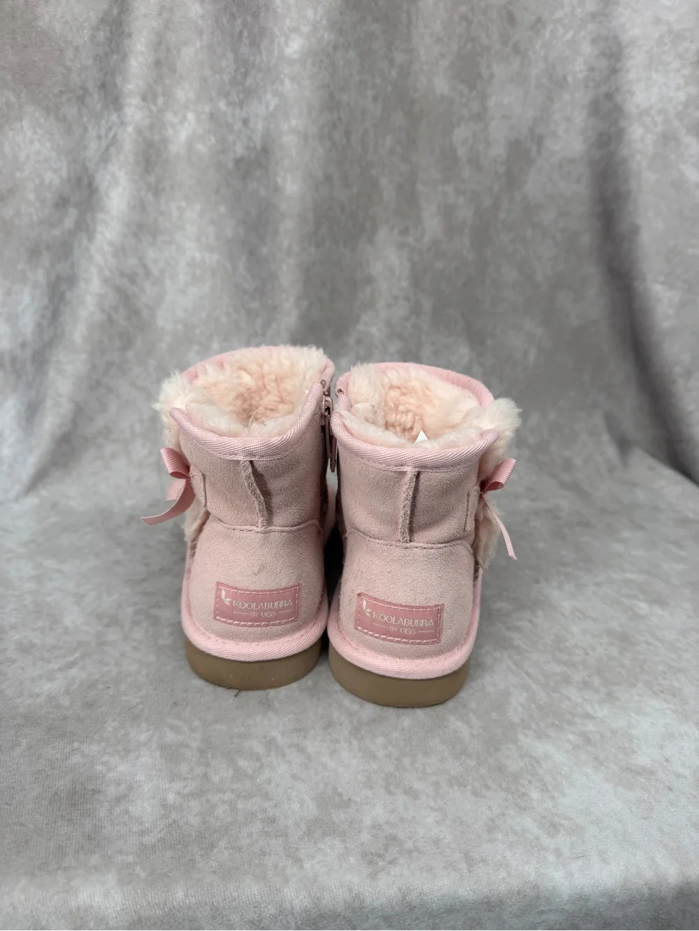 Koolaburra Pink Faux-Shearling Ankle Boots with Pom Detail